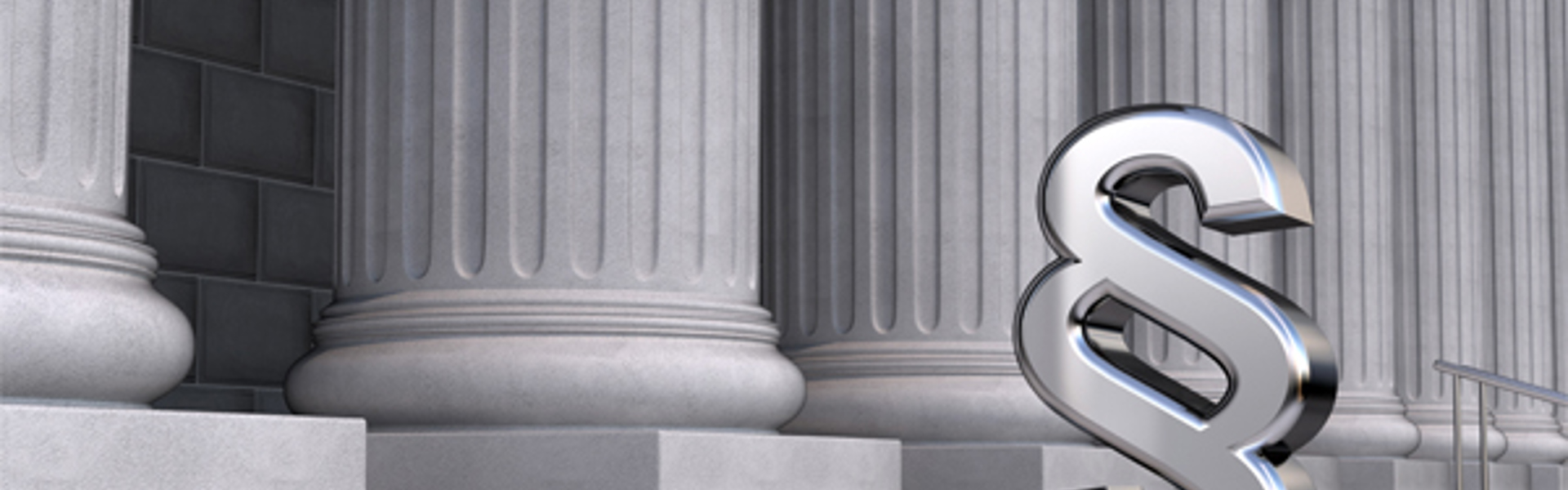 Paragraphzeichen auf den Stufen vor dem Parlament